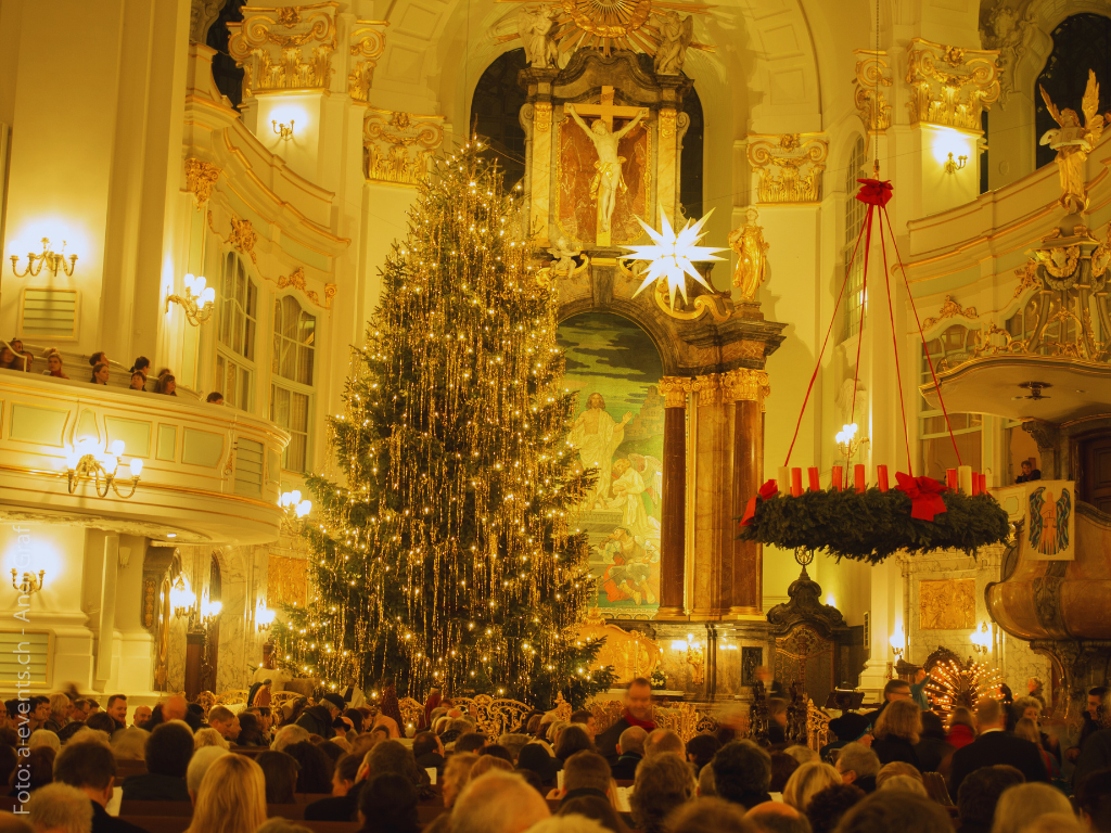 Christmas fundraising event at a church with tree and lights