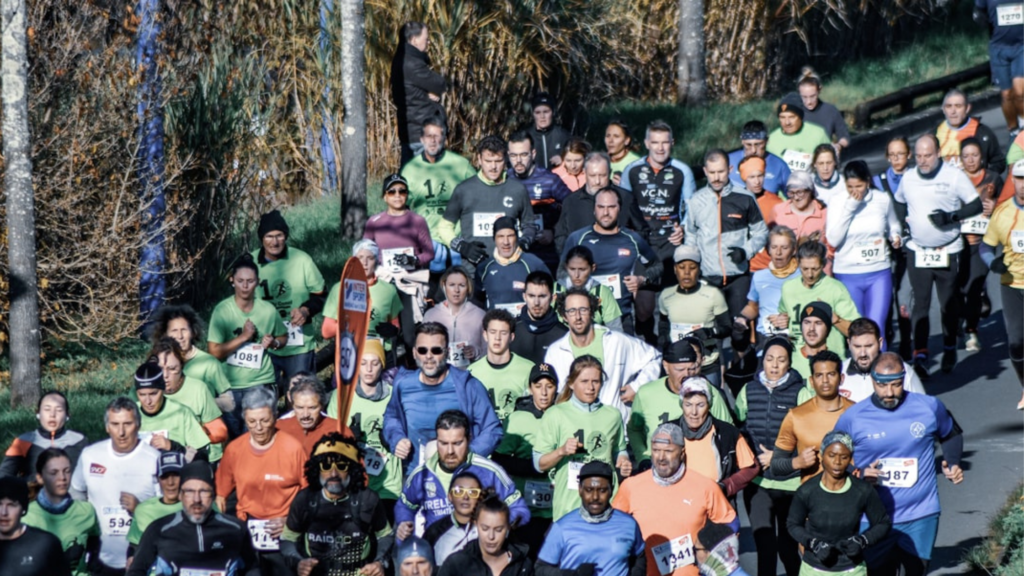 Running race with runners racing after fundraising for their place
