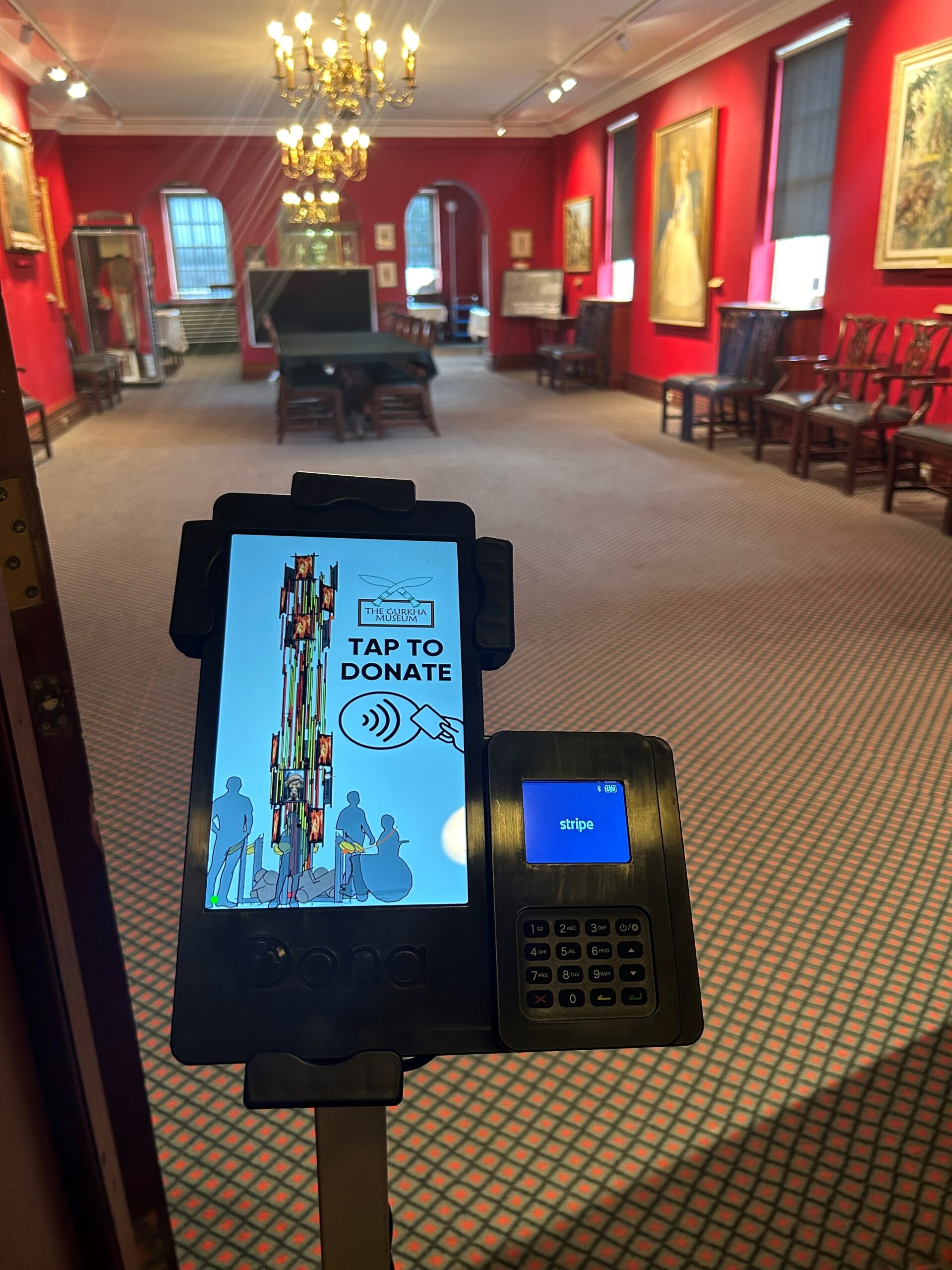 Inside the Gurkha museum with a dona contactless donation machine at the front