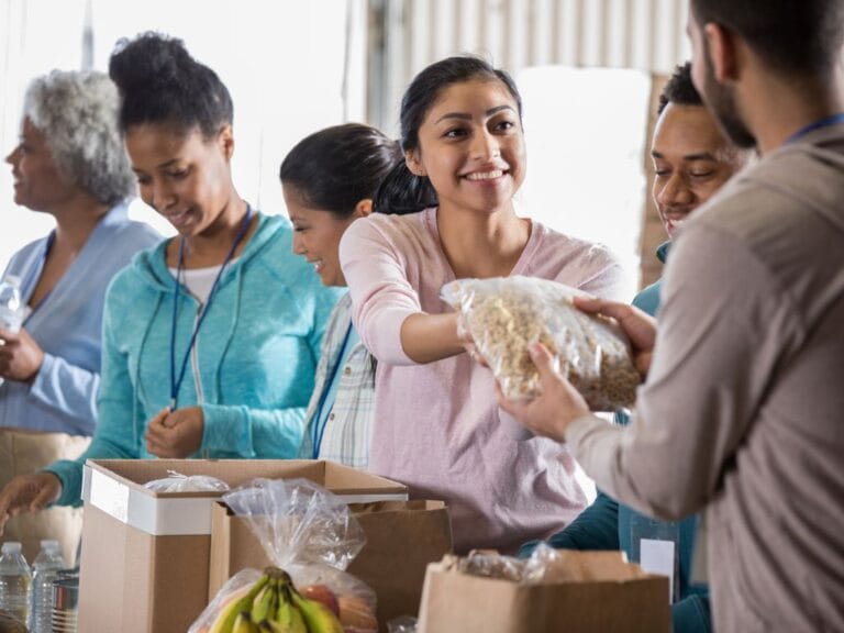 Handing around and collecting donations at events with volunteers