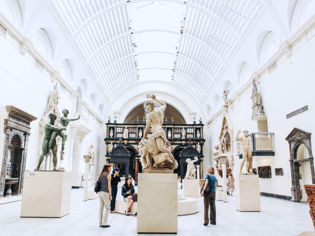 Museum exhibits with visitors browsing